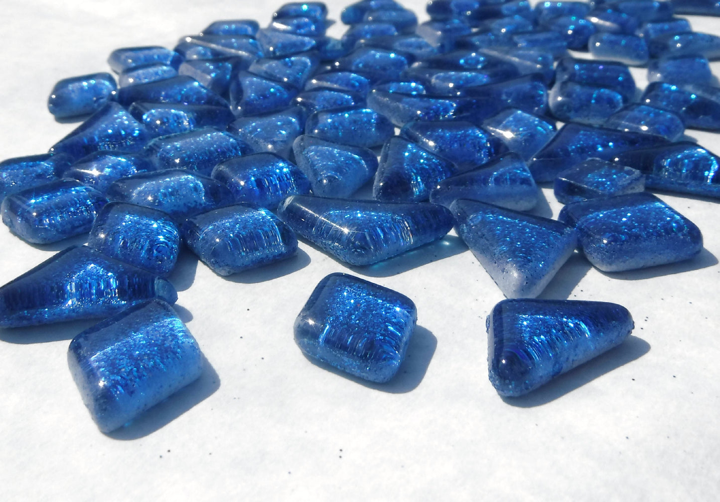 Blue Glitter Puzzle Tiles - 100 grams in Assorted Shapes Glass Mosaic Tiles in Medium Blue