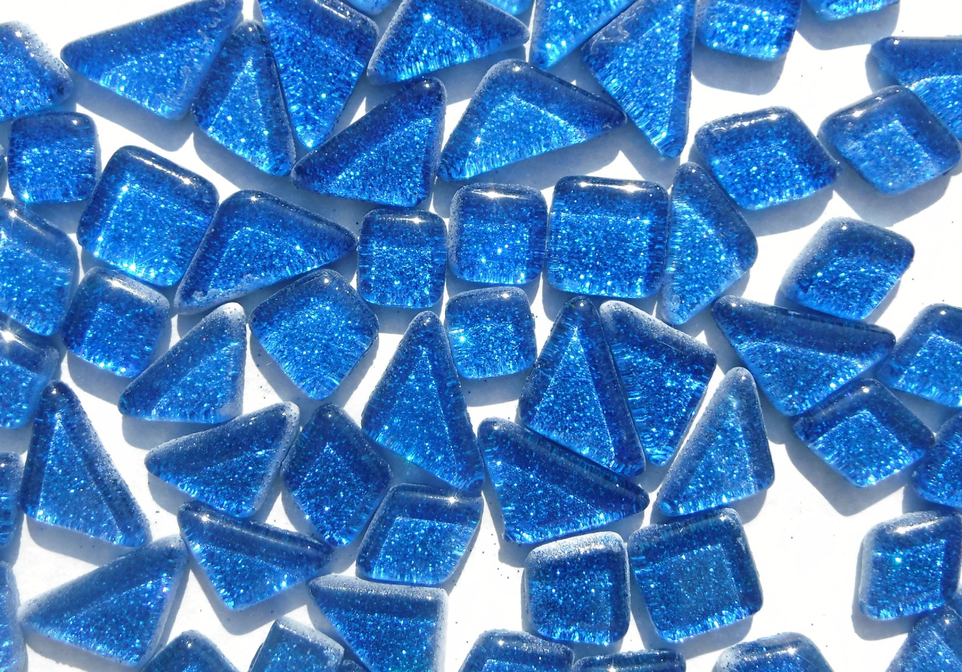 Blue Glitter Puzzle Tiles - 100 grams in Assorted Shapes Glass Mosaic Tiles in Medium Blue