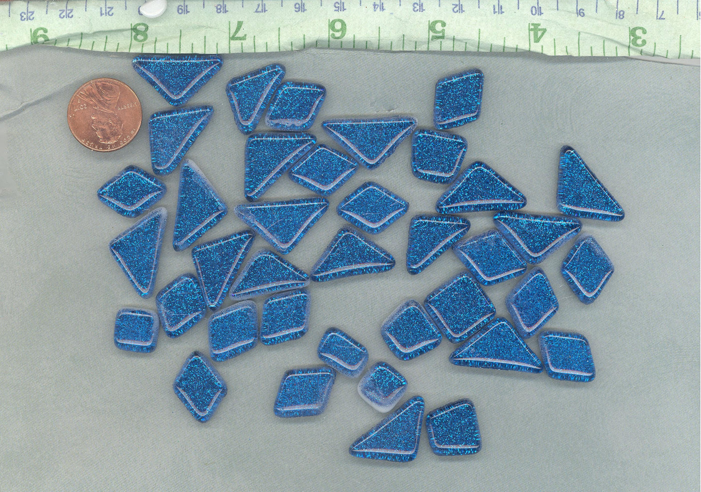 Blue Glitter Puzzle Tiles - 100 grams in Assorted Shapes Glass Mosaic Tiles in Medium Blue