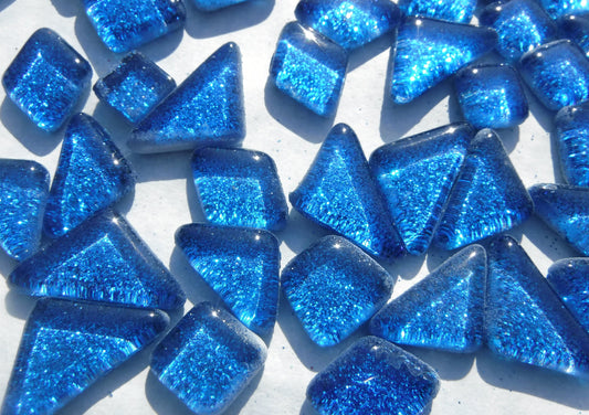 Blue Glitter Puzzle Tiles - 100 grams in Assorted Shapes Glass Mosaic Tiles in Medium Blue
