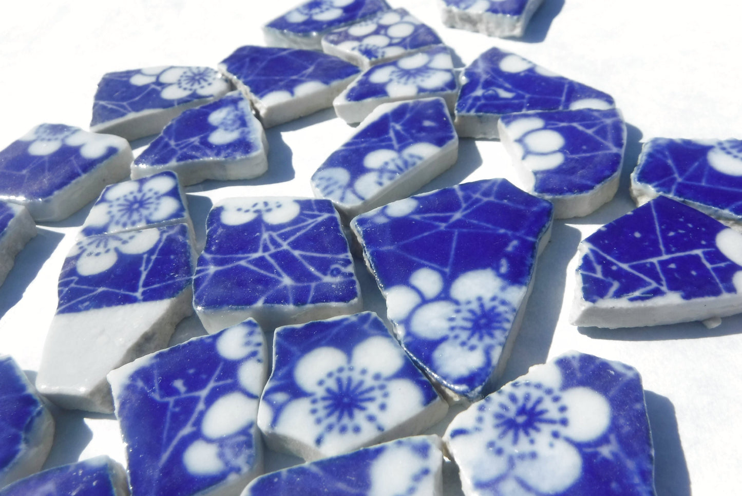 White Flowers on Deep Blue Chunky Floral Mosaic Tiles - Half Pound