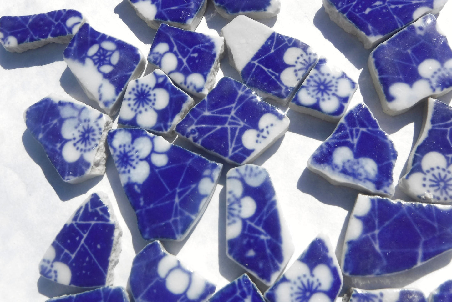 White Flowers on Deep Blue Chunky Floral Mosaic Tiles - Half Pound