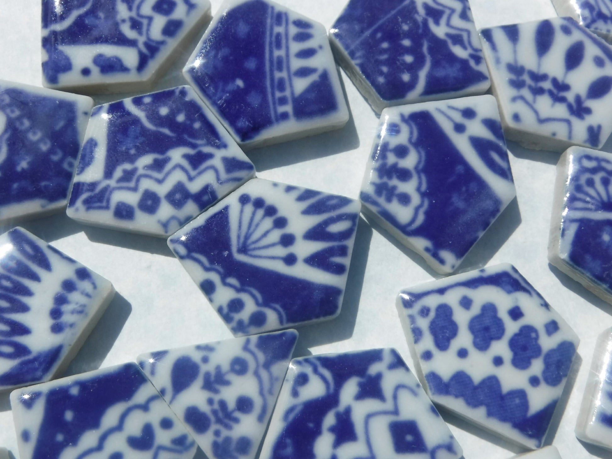 White Decorative Details on Deep Blue Chunky Porcelain Mosaic Tiles - Half Pound