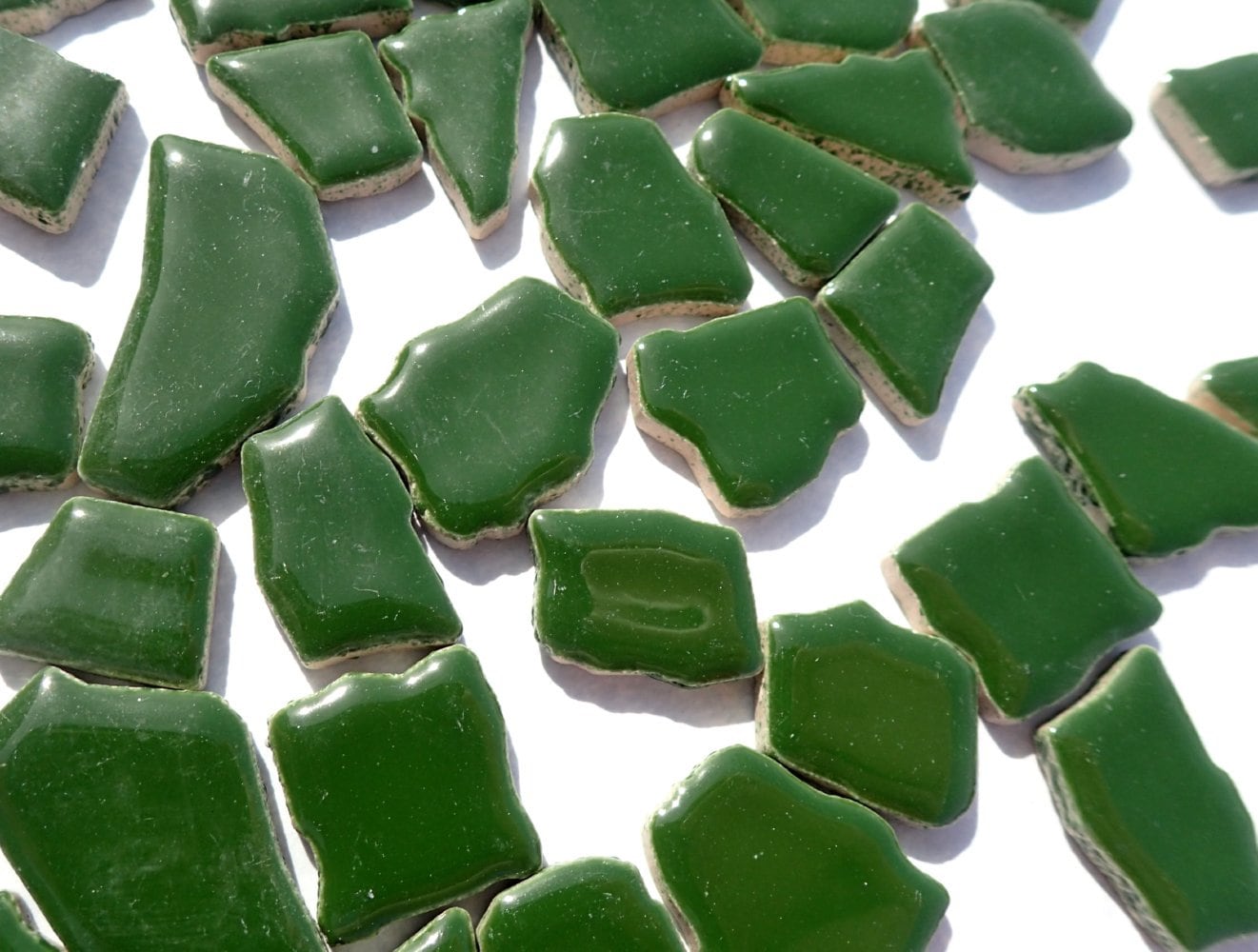 Dark Green Mosaic Ceramic Tiles - Jigsaw Puzzle Shaped Pieces - Half Pound - Assorted Sizes Random Shapes in Pesto