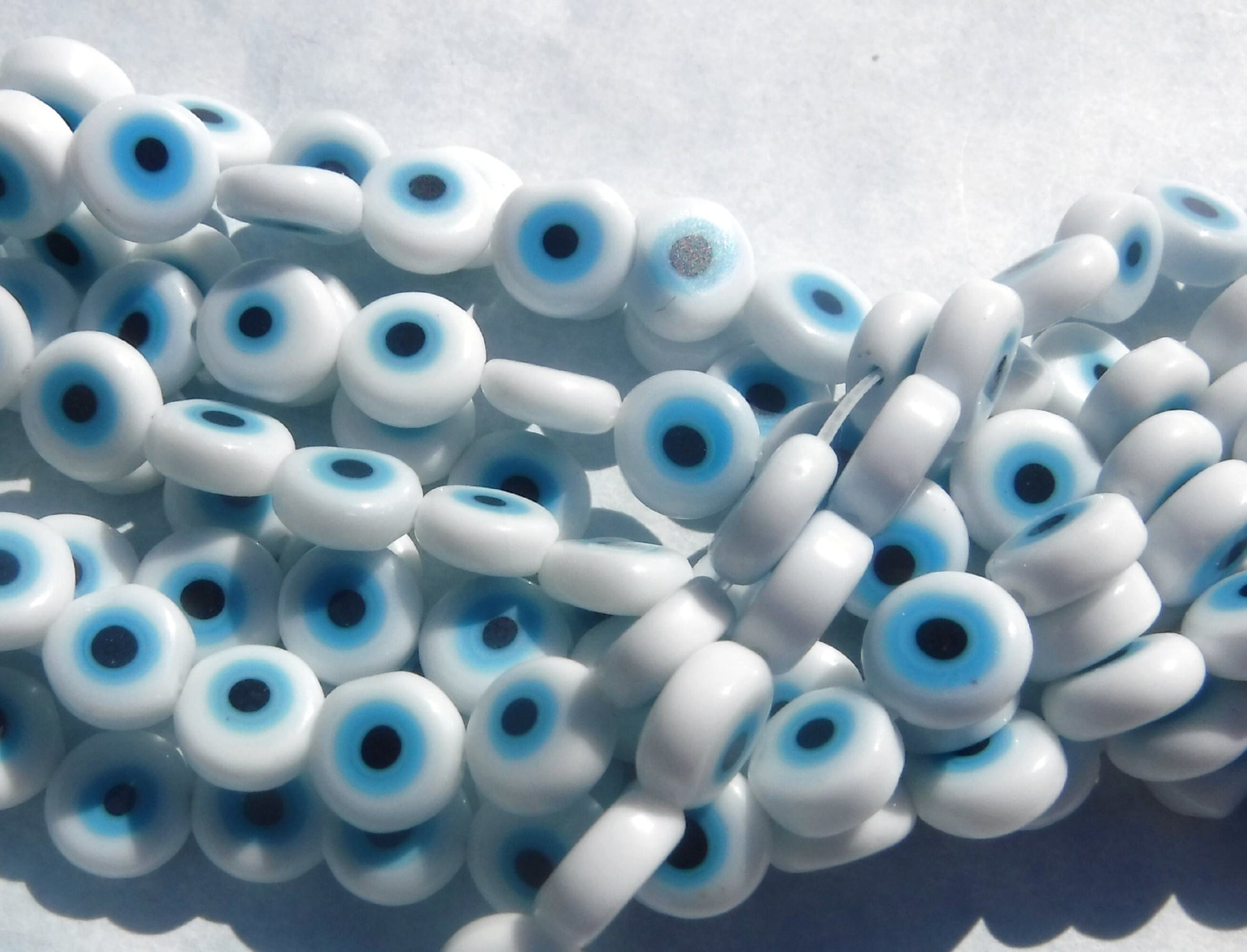 Blue and white evil eye beads