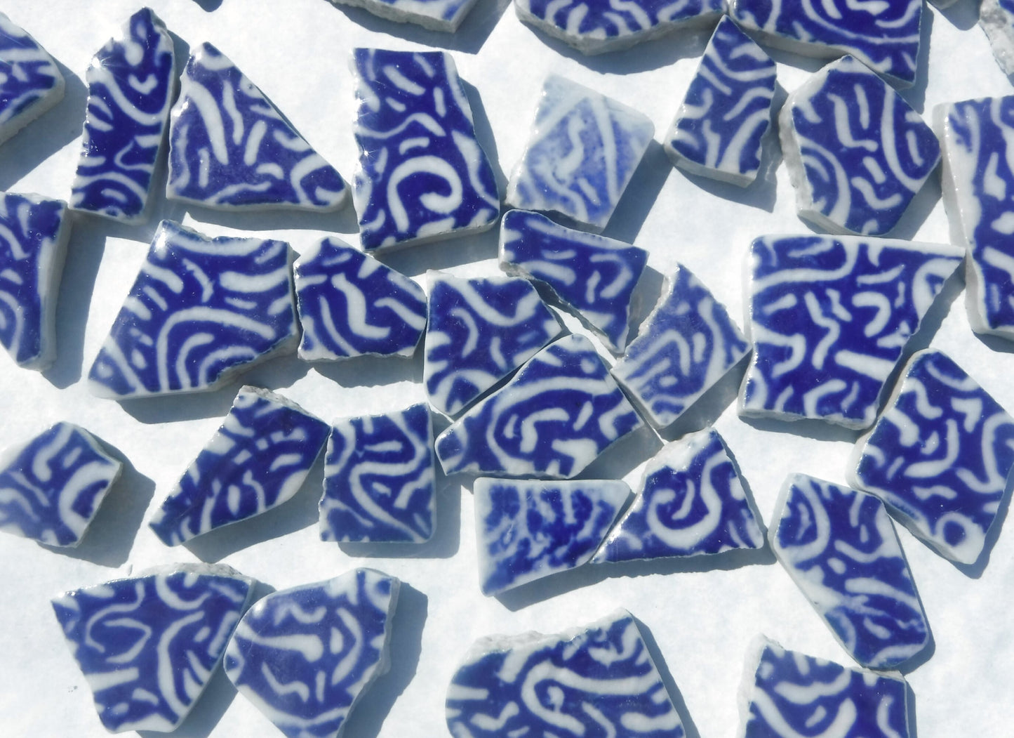 White Squiggles on Deep Blue Chunky Porcelain Mosaic Tiles - Half Pound